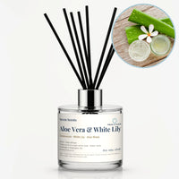 Aloe Vera & White Lily Reed Diffuser by Seven Scents - glass bottle with aloe vera leaves, a white flower and aloe gel