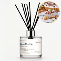 Banoffee Pie Reed Diffuser by Seven Scents - glass bottle with slices of cream-topped banoffee pie
