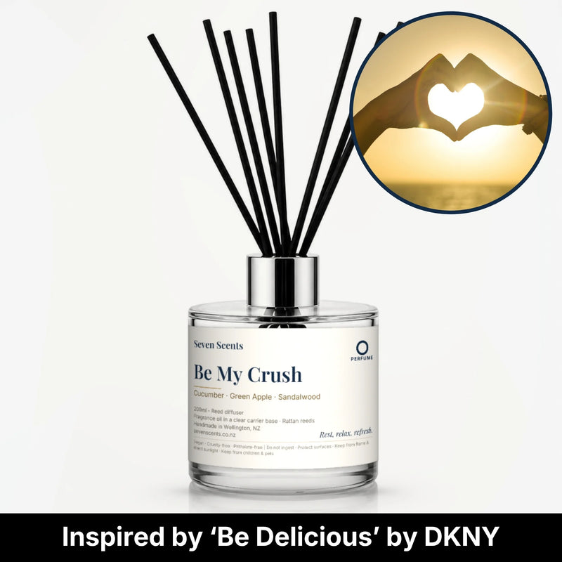 Be My Crush Reed Diffuser by Seven Scents - glass bottle with hands making a heart shape at sunset