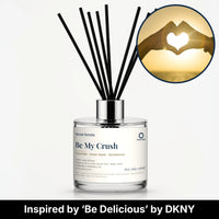 Be My Crush Reed Diffuser by Seven Scents - glass bottle with hands making a heart shape at sunset