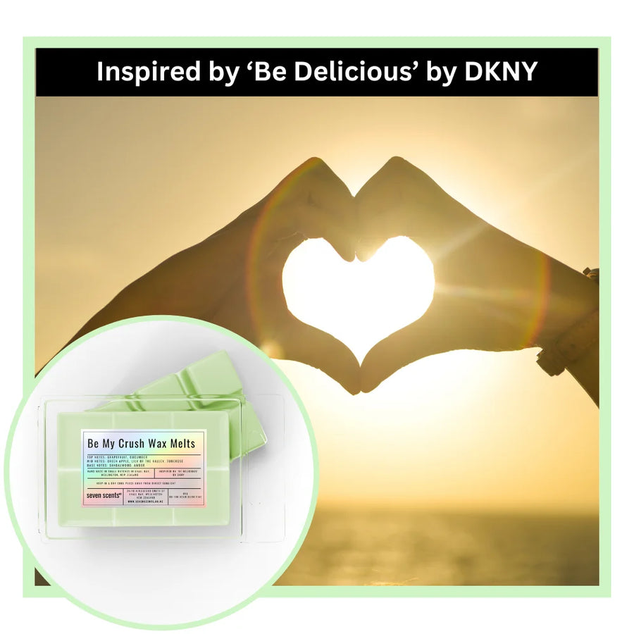Be My Crush wax melts inspired by 'Be Delicious' by DKNY with a heart-shaped hand gesture in the background.