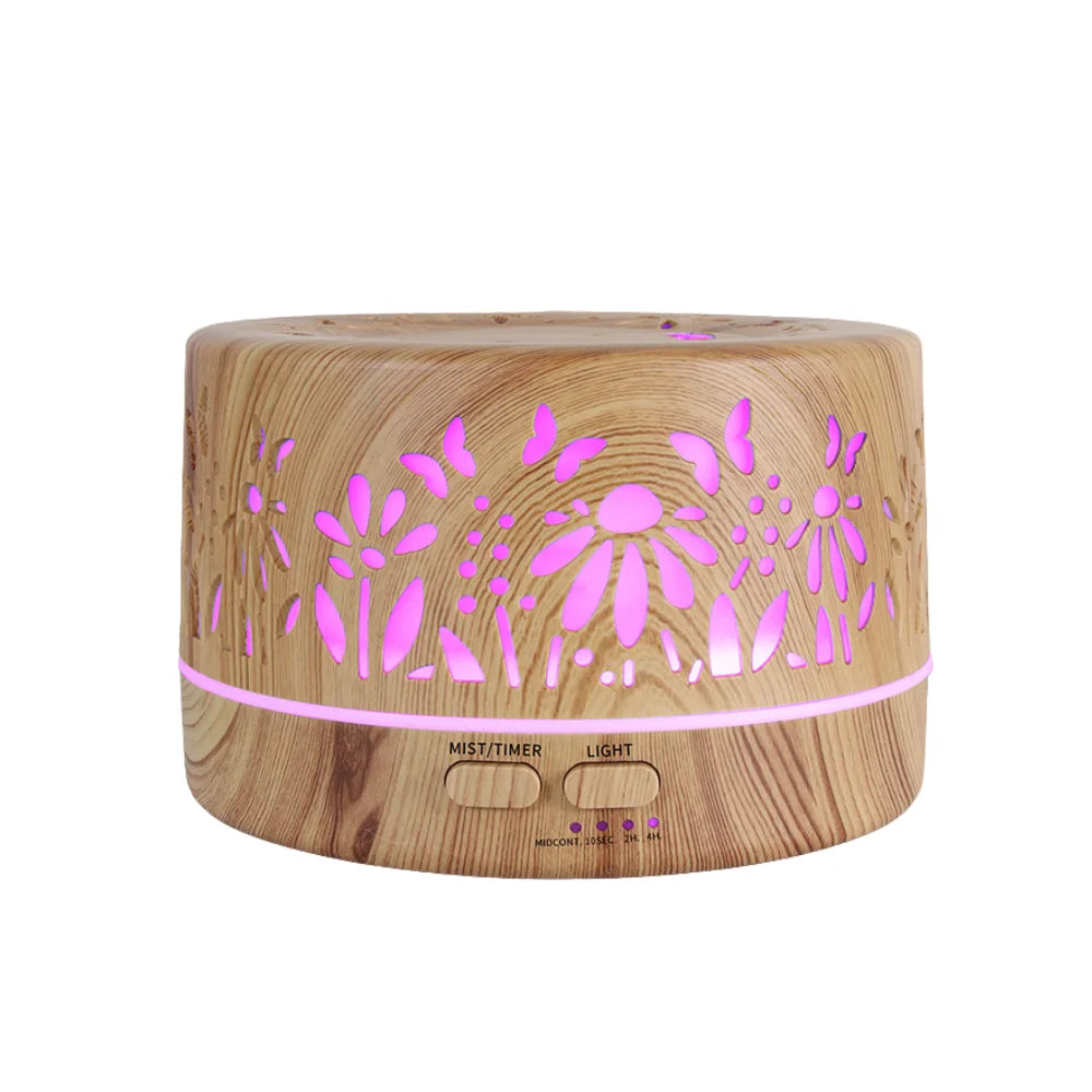 Bella aromatherapy diffuser delicate floral cutouts with LED light glowing through