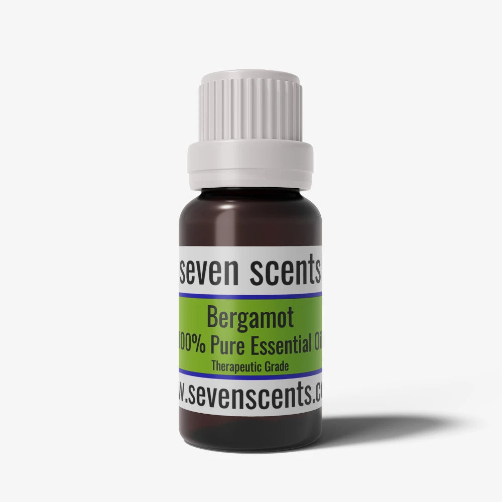 Bergamot essential oil bottle by Seven Scents with a white cap on a white background