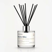 Berry Bliss Reed Diffuser by Seven Scents - 200ml clear glass bottle with black reeds and a silver collar