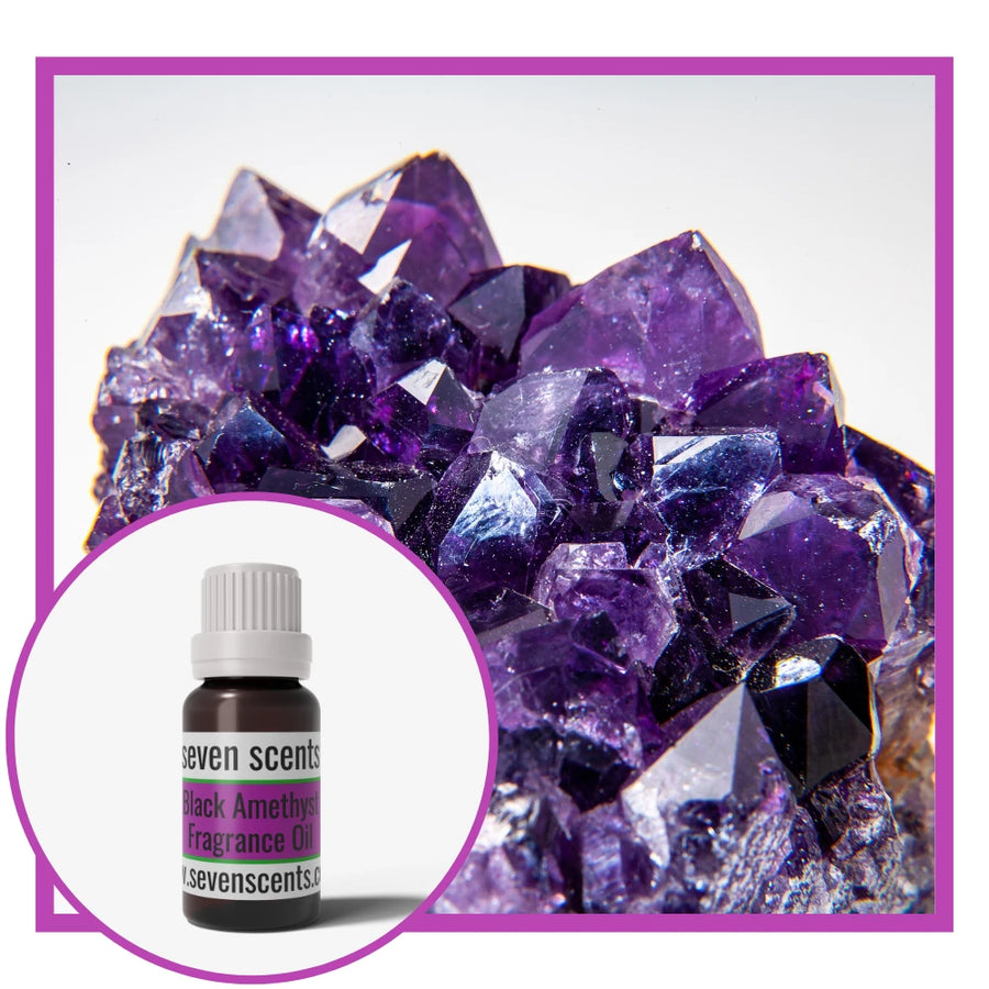 Black amethyst fragrance oil with an amethyst crystal cluster