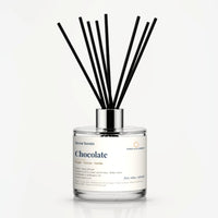 Chocolate Reed Diffuser by Seven Scents - 200ml clear glass bottle with black reeds and a silver collar