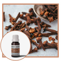 Clove bud essential oil by Seven Scents with dried clove buds