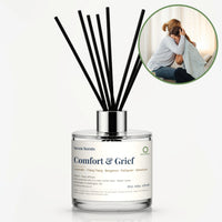 Comfort & Grief Reed Diffuser by Seven Scents - glass bottle with two women sharing a hug