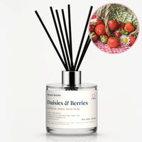 Daisies & Berries Reed Diffuser by Seven Scents - glass bottle with strawberries and daisies spilling from a basket