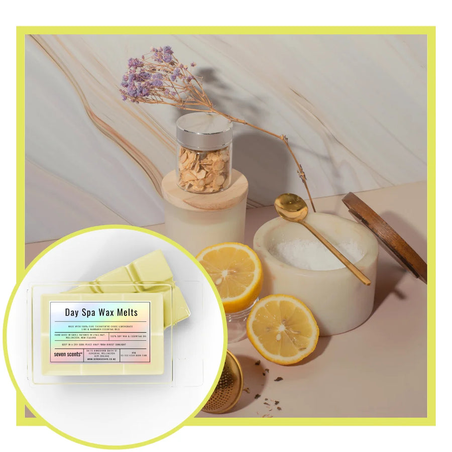 Day Spa Wax Melts packaging with lemon slices and a candle on a decorative surface.