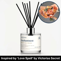 Enchantment Reed Diffuser by Seven Scents - glass bottle with a bouquet of peach roses