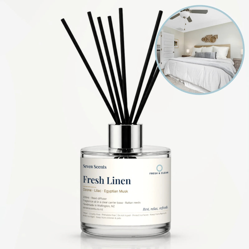 Fresh Linen Reed Diffuser by Seven Scents - glass bottle with a bed dressed in crisp white linen