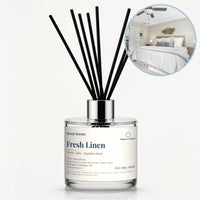 Fresh Linen Reed Diffuser by Seven Scents - glass bottle with a bed dressed in crisp white linen