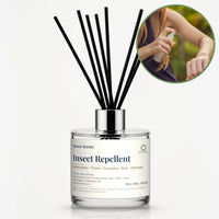 Insect Repellent Reed Diffuser by Seven Scents - glass bottle with a woman spraying her arm outdoors