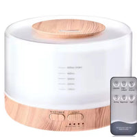 Luca essential oil diffuser in light wood-grain, front view - Seven Scents