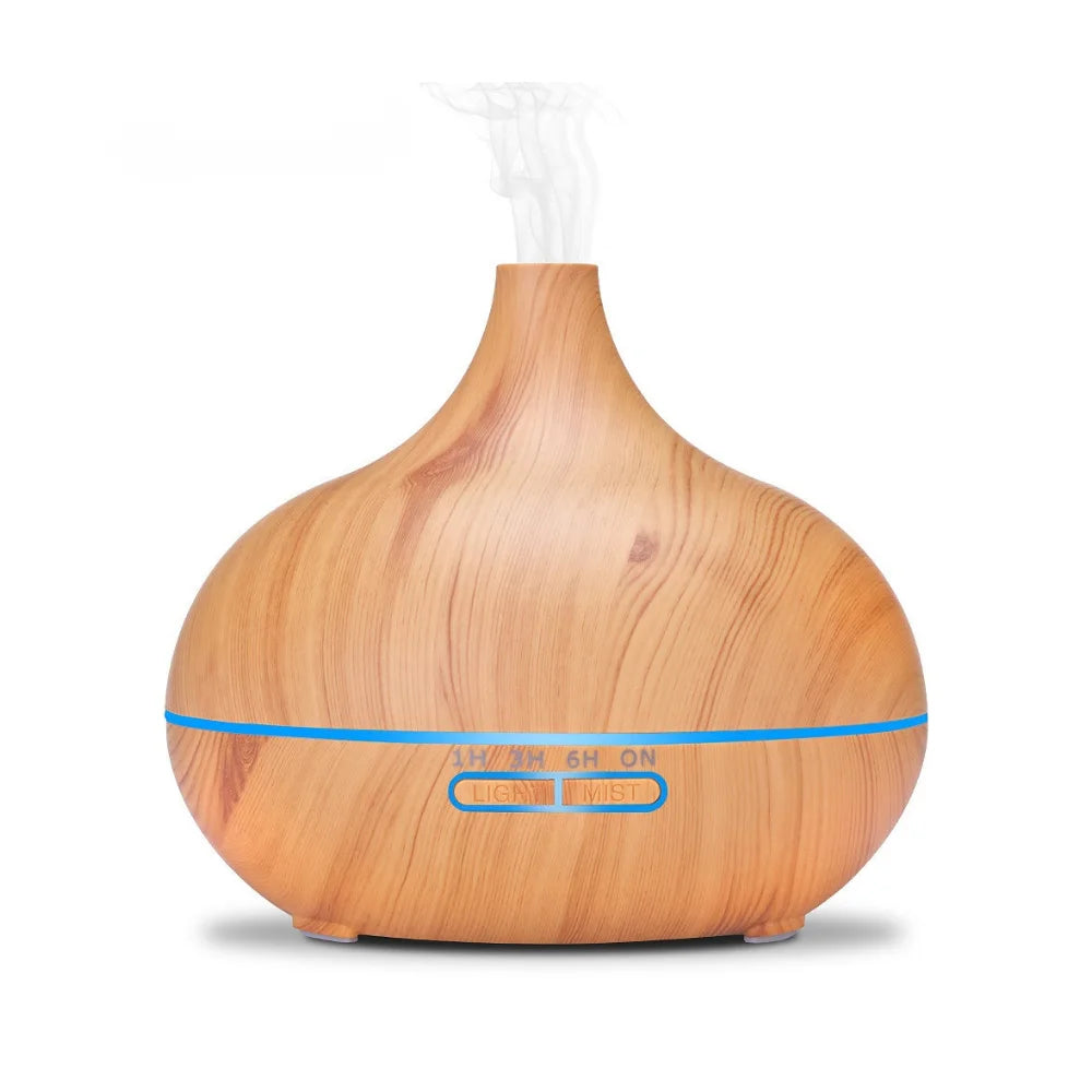 Lucy aromatherapy diffuser natural wood finish with soft LED light glowing