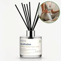 Meditation Reed Diffuser by Seven Scents - glass bottle with a woman meditating cross-legged