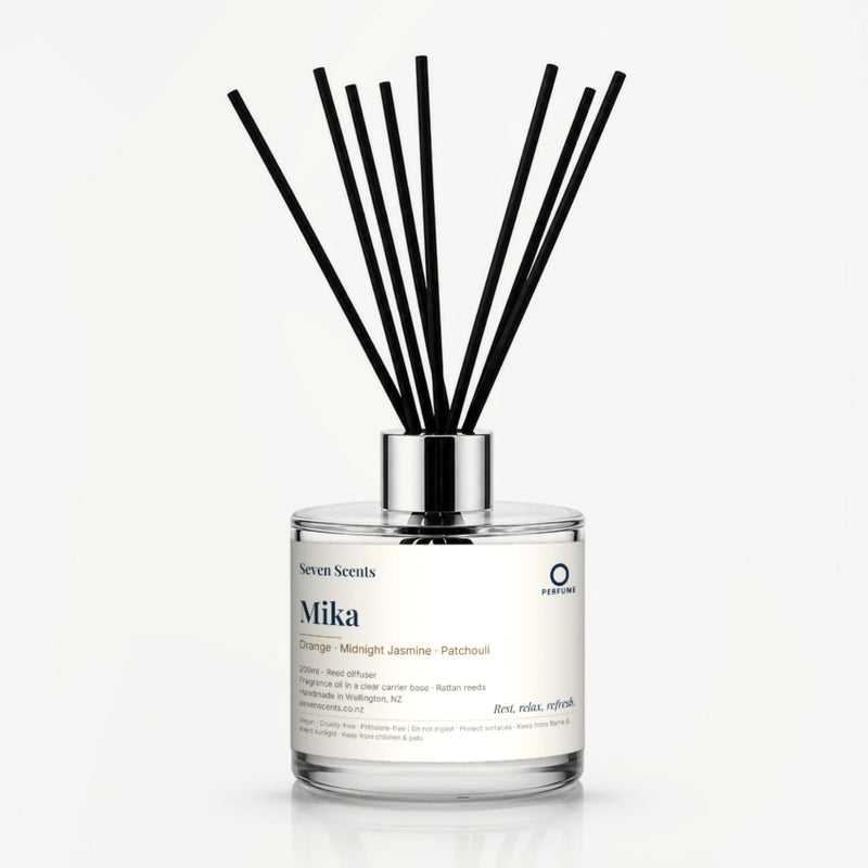 Mika Reed Diffuser by Seven Scents - 200ml clear glass bottle with black reeds and a silver collar