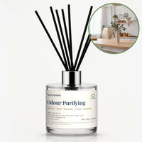 Odour Purifying Reed Diffuser by Seven Scents - glass bottle with a bright kitchen with plants