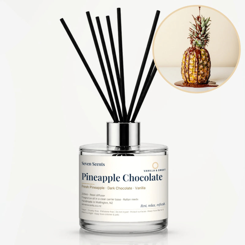 Pineapple Chocolate Reed Diffuser by Seven Scents - glass bottle with a pineapple drizzled with chocolate
