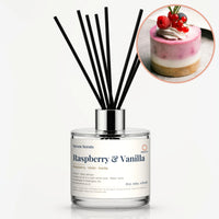 Raspberry and Vanilla Reed Diffuser by Seven Scents - glass bottle with a raspberry mousse cake topped with berries