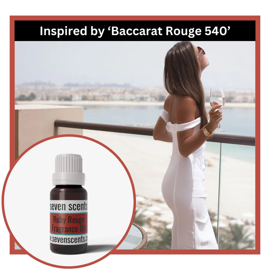 Woman in white dress on balcony with Seven Scents Ruby Rouge fragrance oil inspired by Baccarat rouge 540