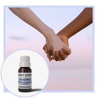 Sensual essential oil blend by Seven Scents with two hands holding