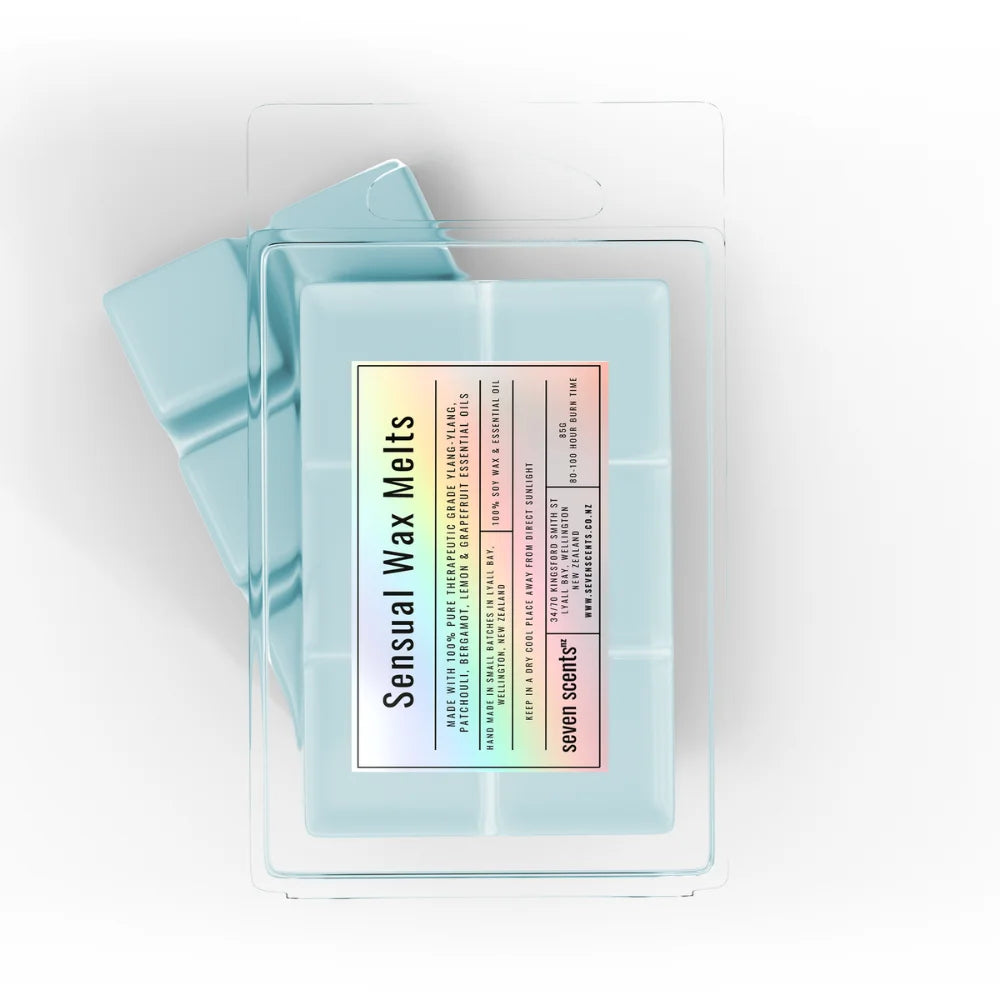 Pack of 'Sensual Wax Melts' by seven scents on a white background