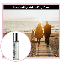 Two people walking on a wooden pier by the beach with sweet obsession perfume oil inspired by addict by Dior