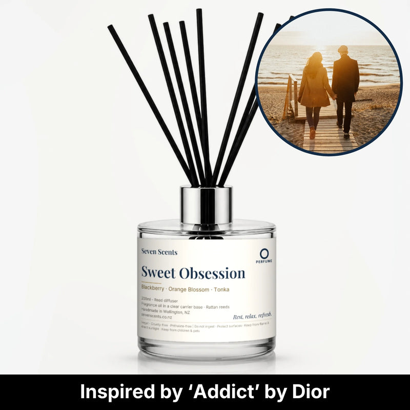 Sweet Obsession Reed Diffuser by Seven Scents - glass bottle with a couple walking on a beach at sunset