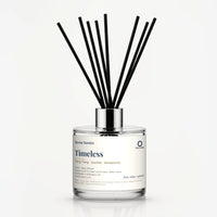 Timeless Reed Diffuser by Seven Scents - 200ml clear glass bottle with black reeds and a silver collar