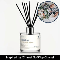 Timeless Reed Diffuser by Seven Scents - glass bottle with white roses, ribbon and a small perfume bottle
