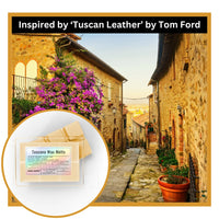 Tuscan street scene with stone buildings and flowers, featuring Tuscan Wax Melts inspired by 'Tuscan Leather' by Tom Ford.