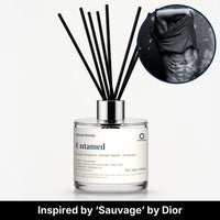Untamed Reed Diffuser by Seven Scents - glass bottle with a black and white photo of a shirtless man