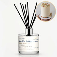 Vanilla Buttercream Reed Diffuser by Seven Scents - glass bottle with a cake topped with buttercream swirls