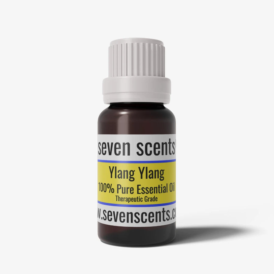 Ylang Ylang Essential Oil bottle with a white cap on a white background